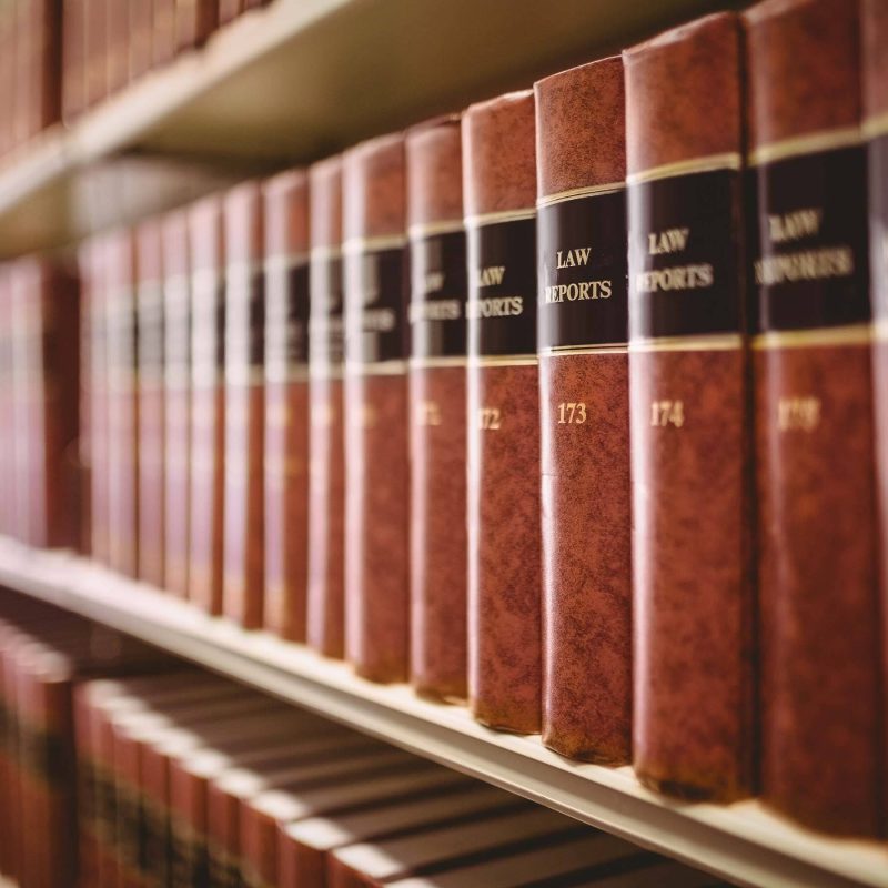 Close-up of law reports in a legal library Lusko Law research Pensacola